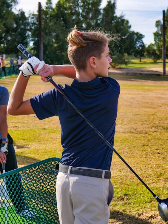 School golf team practicing on ParX simulator